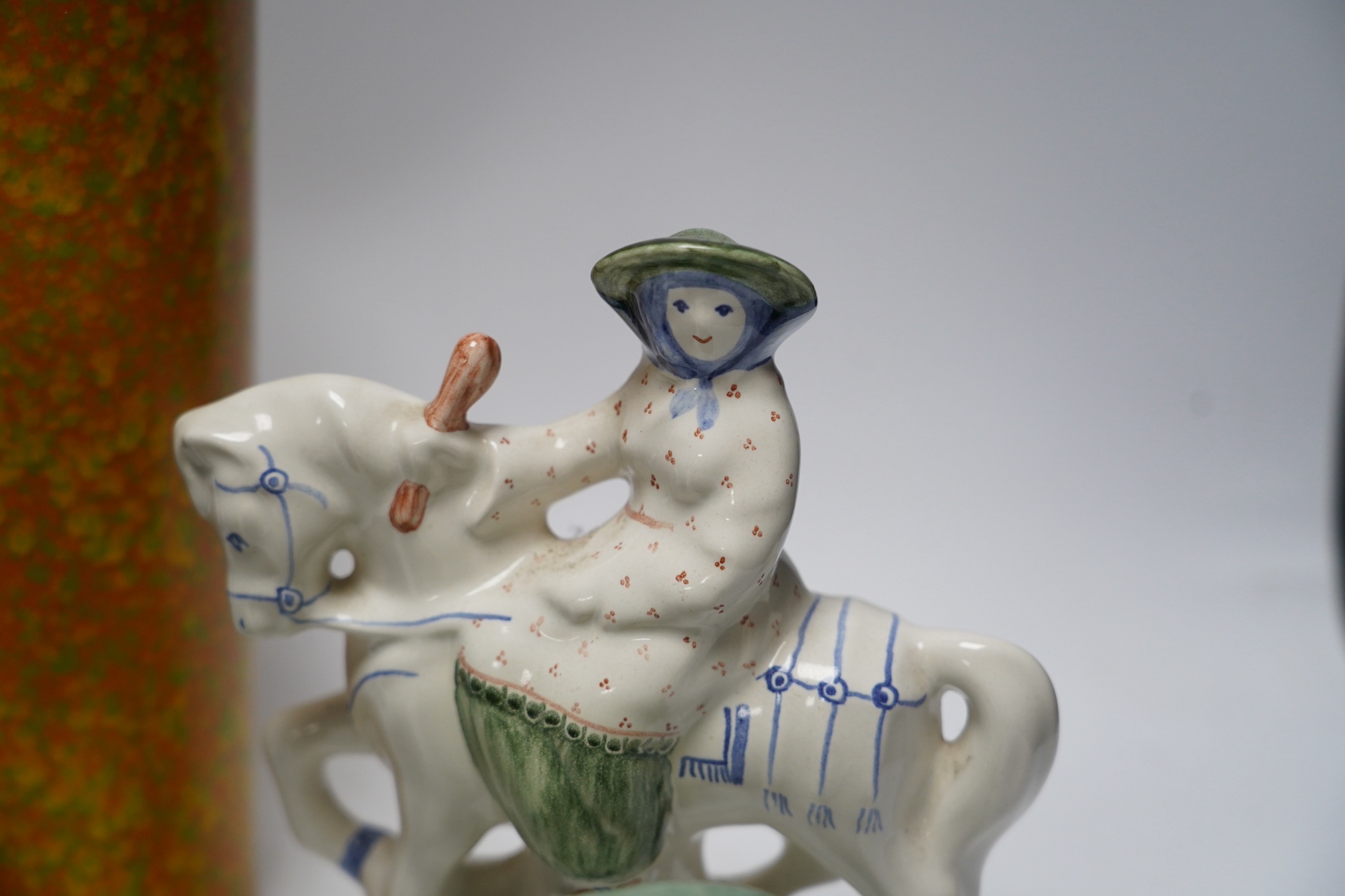 A Rye Pottery figure of Chaucer's Wife of Bath, five various pottery vases and a pottery bear, tallest 27cm high